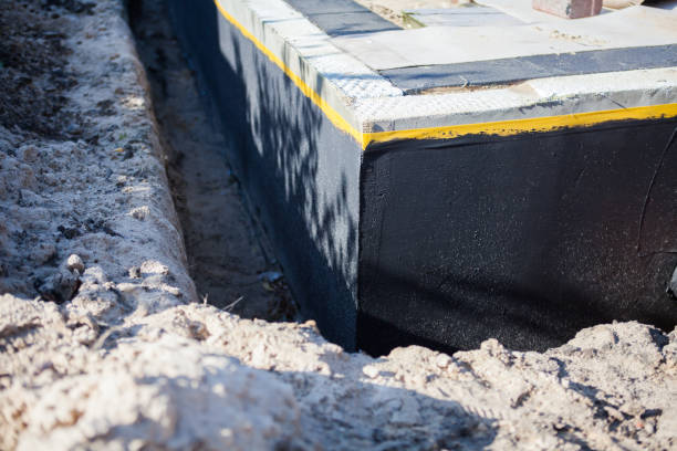 Professional Exterior Waterproofing technician working in Leoma, TN